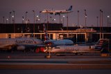 Thunderstorms over Chicago caused dozens of flights to divert, including one that took 3 attempts to land