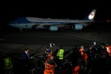 PHOTOS: Trump Touches Down For UK State Visit Arrival