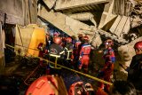 Desperate Indonesian Parents Await News After School Collapse