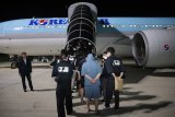 64 South Koreans Held In Cambodia Return Home Under Arrest